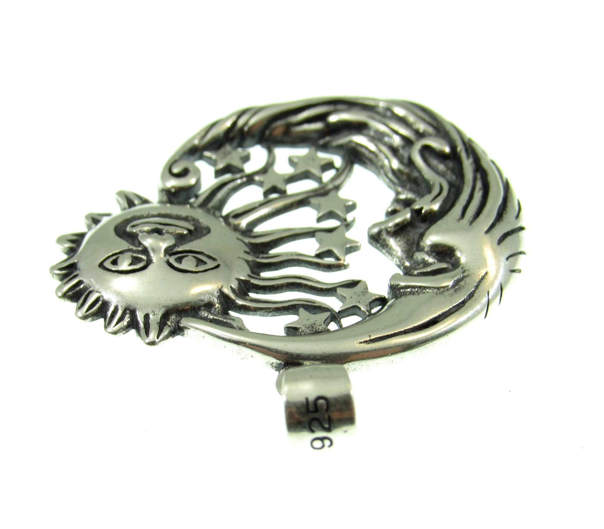 The bail on the sun moon and stars pendant is stamped 925 for purity. The sterling silver pendant weighs 3.9 grams.