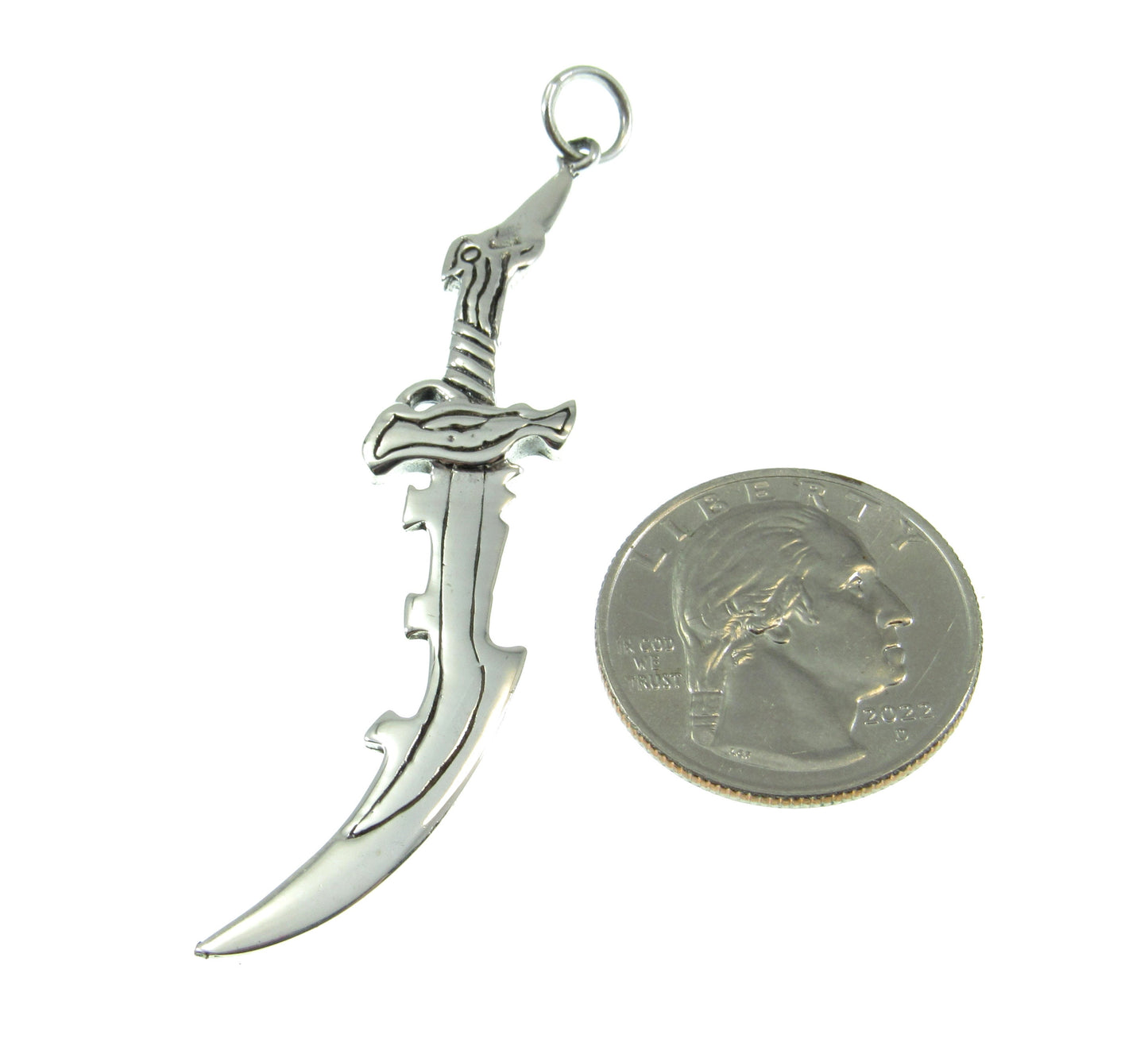 The medieval sword pendant is quite long when compared to a US quarter, it measures 2 3/4 inches long and 9/16 inches wide