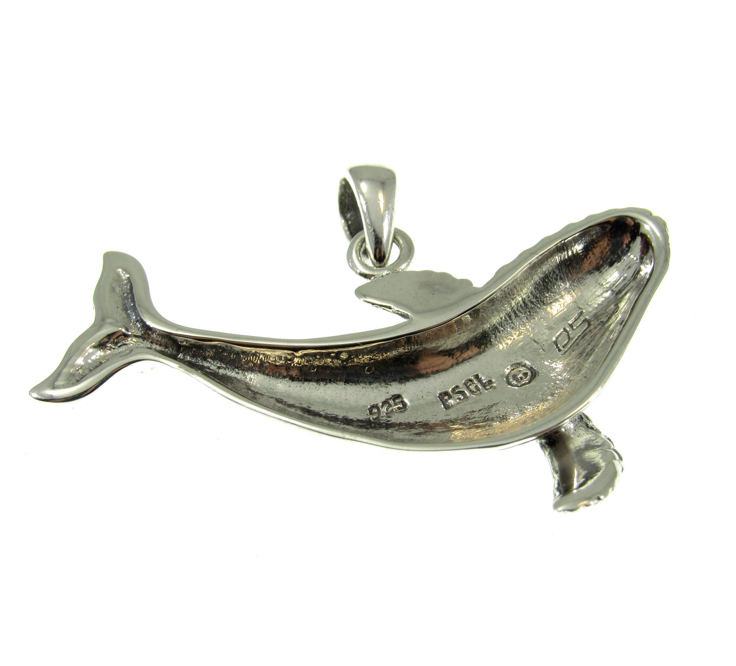 The humpback whale pendant is quality stamped 925 and is signed with a Peter Stone hallmark. The pendant weighs 4.5 grams of solid silver.
