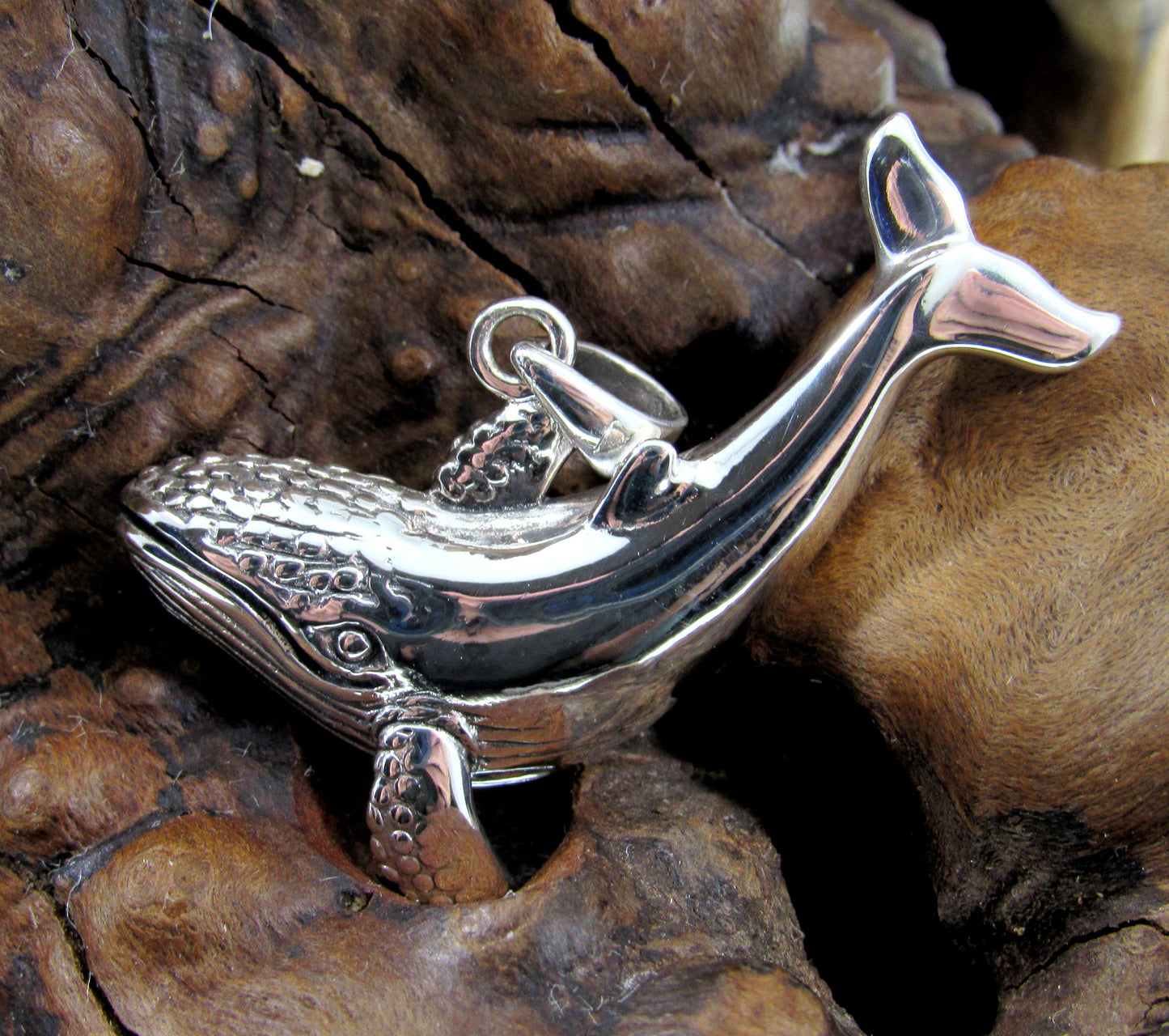 The humpback whale pendant is meticulously detailed in solid sterling silver and brings the ocean directly to your jewelry wardrobe.