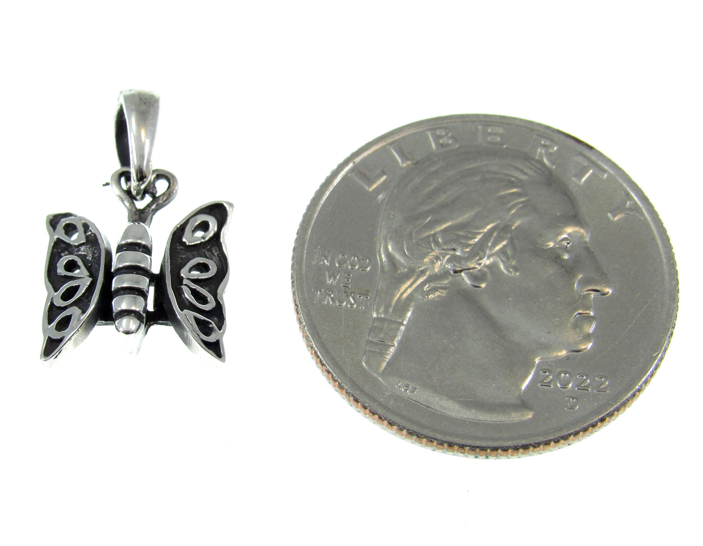 The solid sterling silver butterfly charm is smaller than a US quarter and measures 13/16 Inches long including the bail and 1/2 inch wide.