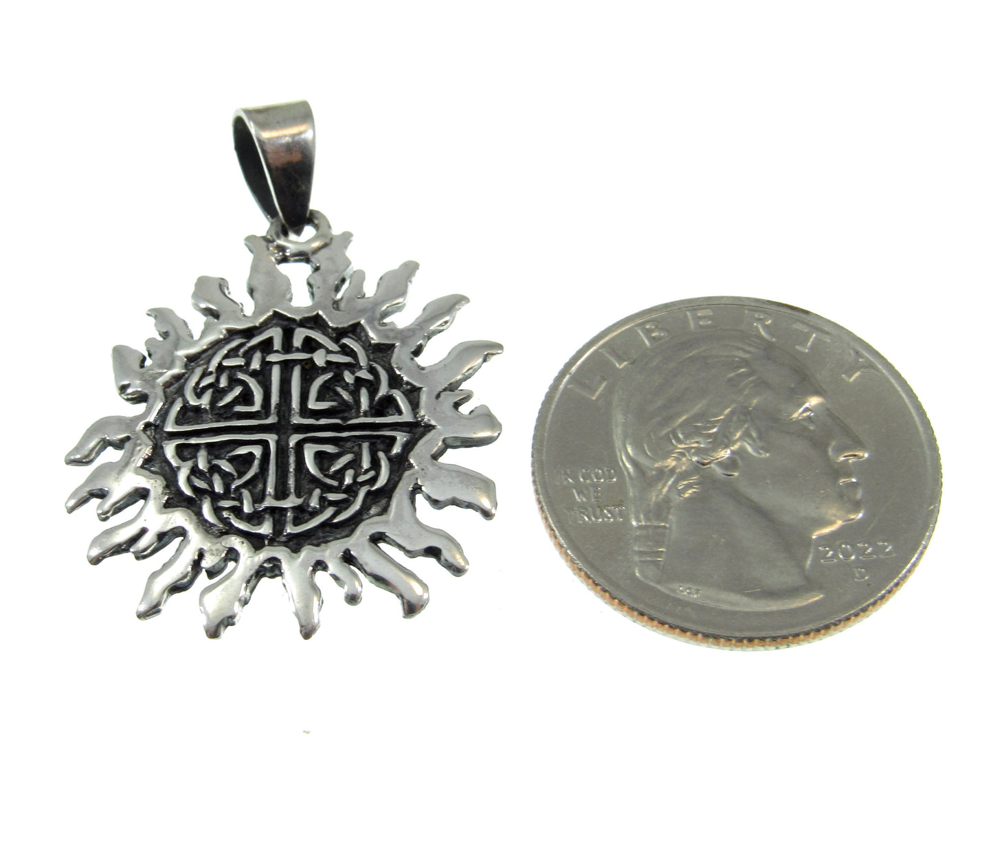 Slightly larger than a US quarter, the sterling silver Celtic sun with quaternary knots pendant measures 1 3/4 inches long including the bail and 1 inch wide.