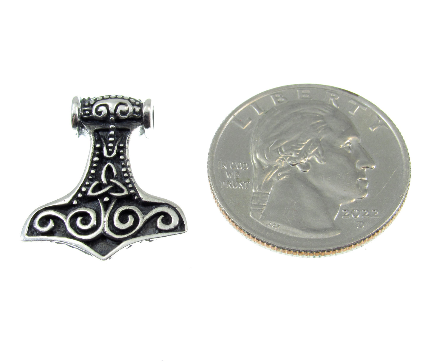 A bit smaller than a US quarter, the sterling silver Celtic Thor's hammer slide pendant measures 7/8 inches long by 3/4 inches wide