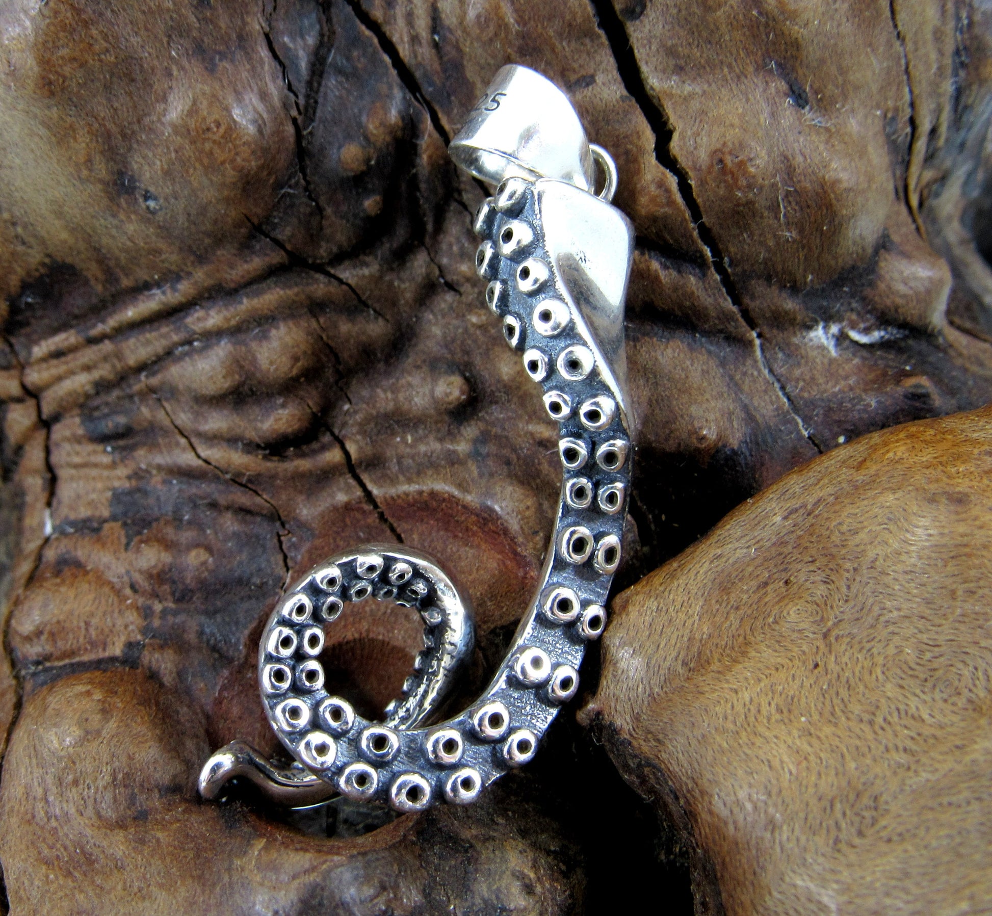 This Handcrafted Pendant Features a Highly Detailed Knobby Octopus Tentacle