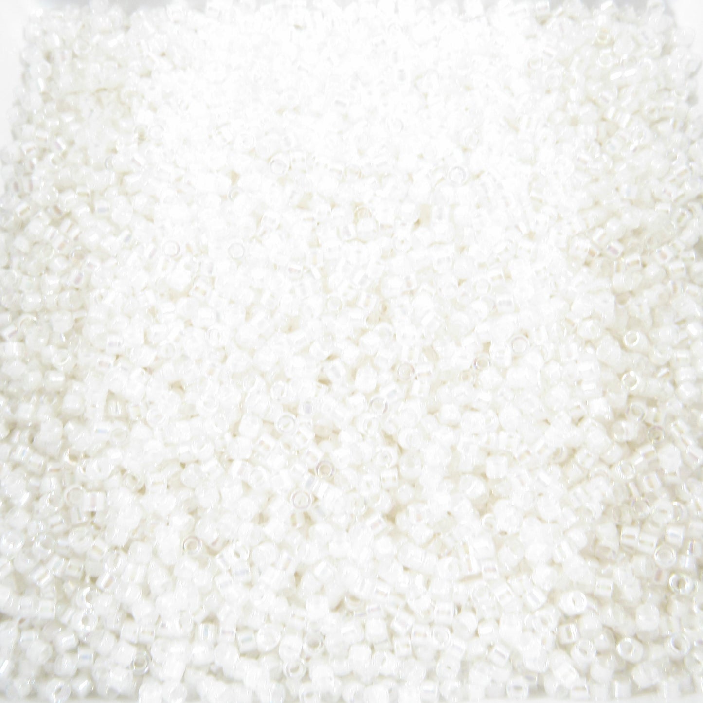 DB0052 11/0 Miyuki Pale Peach Lined Crystal AB Delica Seed Beads, 5 Grams Tube, 25 Grams Bag, DB52, DB-52 Japanese Glass Delicas for Jewelry